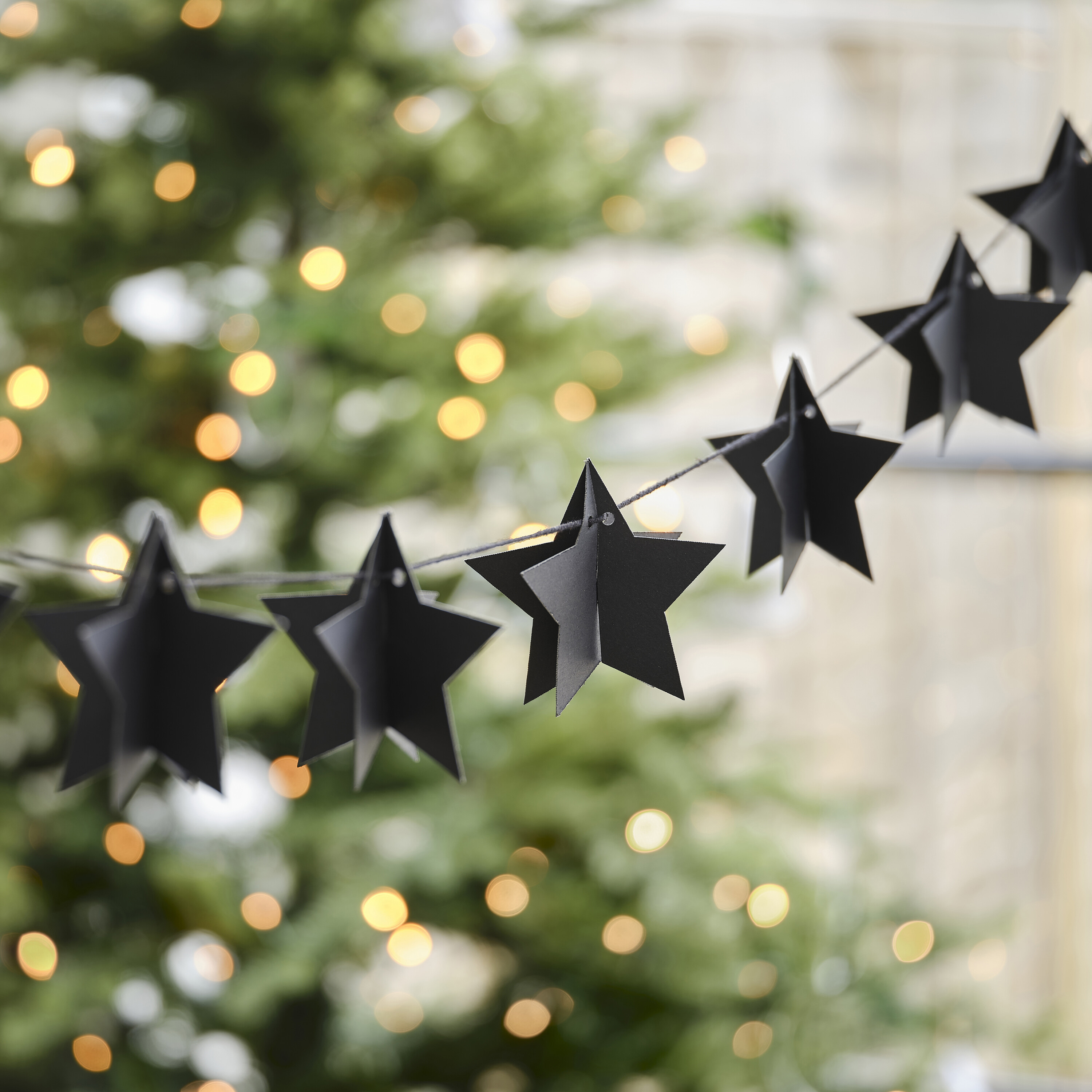 black christmas tree garland